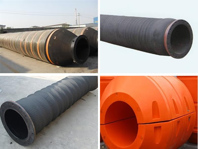 Several hose floats, a suction dredge hose, a floating dredge hose and a discharge dredge hose.